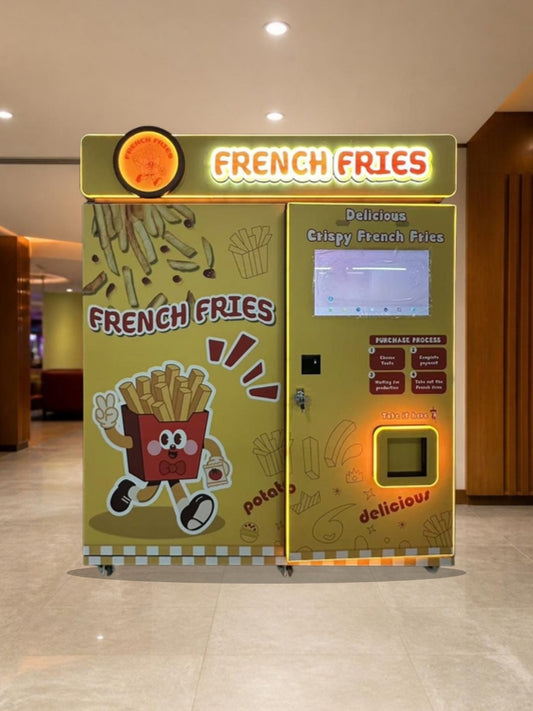 Máquina automática de papas fritas en el vestíbulo techado de un centro de entretenimiento familiar