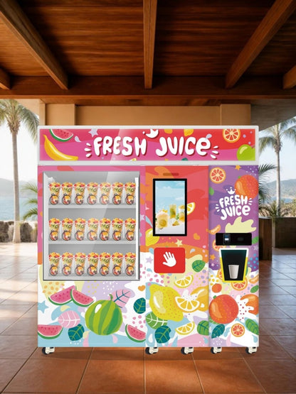Máquina expendedora de batidos y smoothies congelados bajo la terraza techada de una zona de comida frente al mar