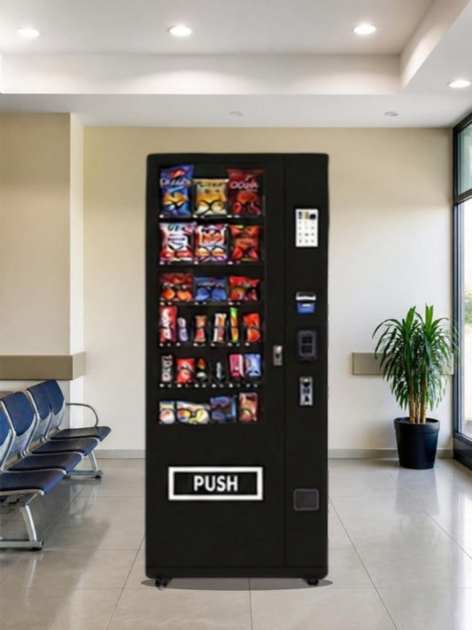 Máquina expendedora de snacks de 36 canales con pantalla táctil en la sala de espera techada de un hospital