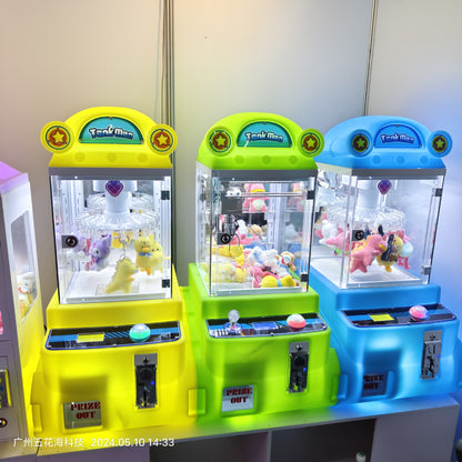 Pequeña máquina de garras de premios para niños, diferentes colores.