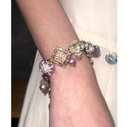 Pulsera vintage lila de acero de titanio con perlas de concha y piedras naturales