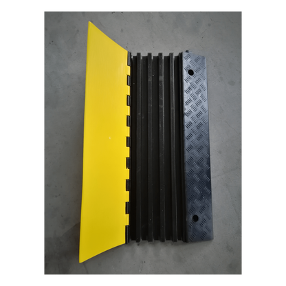 Protector de Cable de 5 Canales / Base de Goma y Tapa de Plástico / Capacidad 4.6 Toneladas / Canal 38x35MM / Longitud 90 cm / Amarillo y Negro